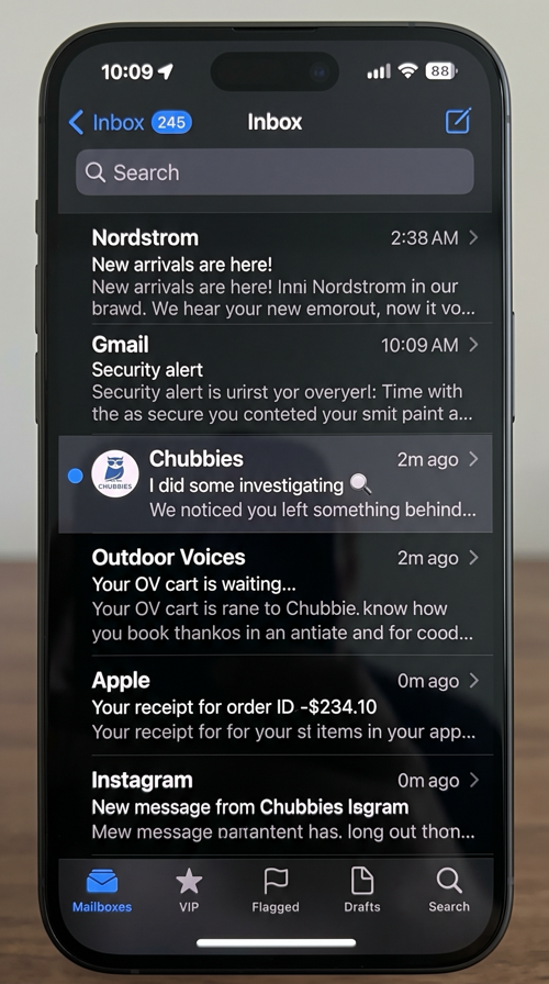 iPhone dark mode email inbox showing Chubbies abandoned cart subject line I did some investigating with magnifying glass emoji